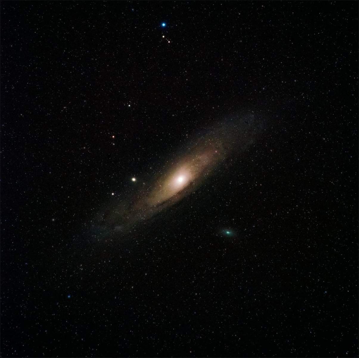 Capture of the majestic Andromeda Galaxy surrounded by countless stars in the night sky.